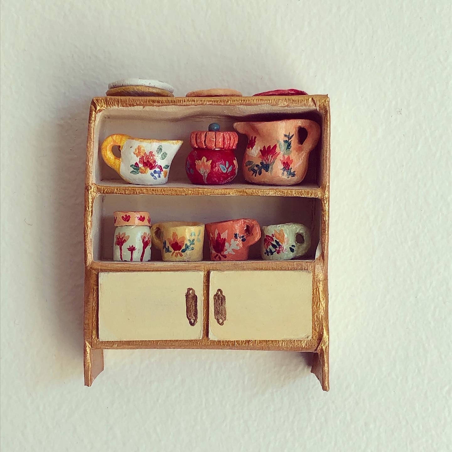 Mostrador de loza miniatura