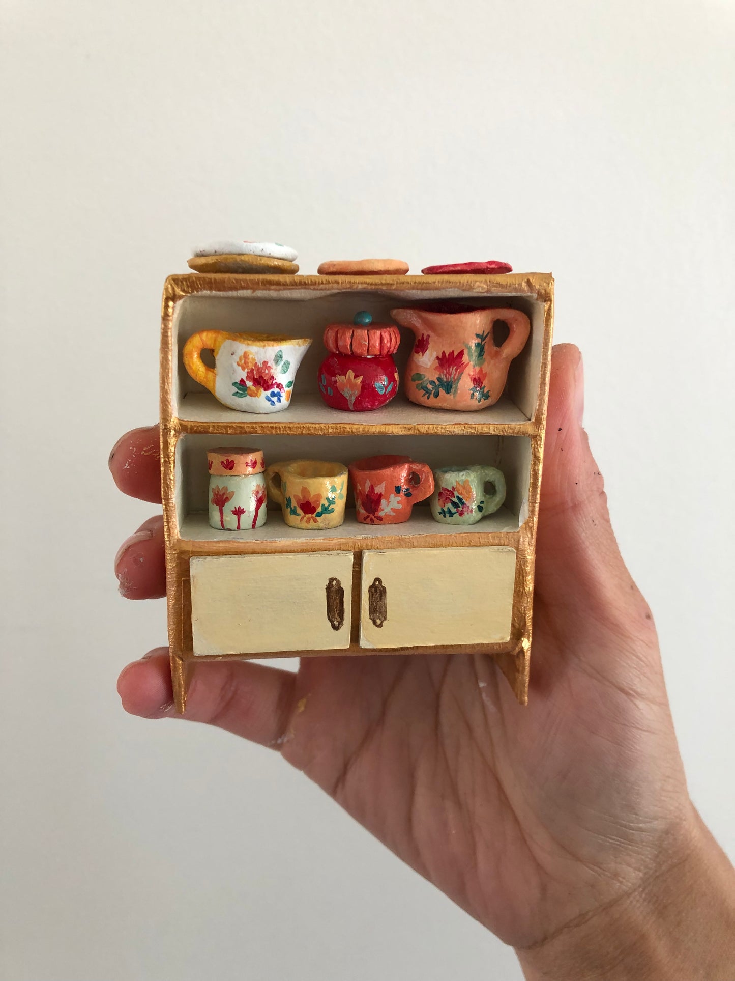 Mostrador de loza miniatura