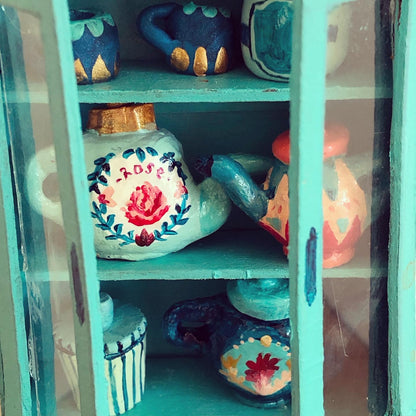 Mostrador de loza miniatura